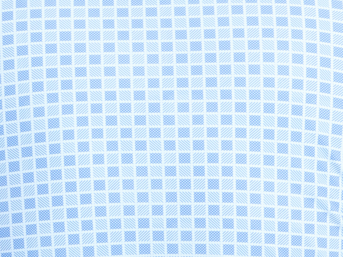 Close-up of the soft, stretchy, and silky knit fabric of the shirt, made from a durable blend of nylon, polyamide, and polyester, ensuring comfort and longevity throughout the day.