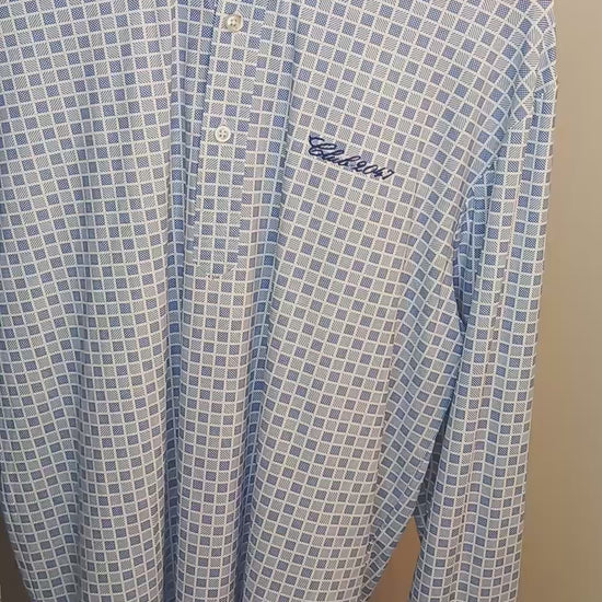 A high-quality full view of a men’s checkered office shirt, demonstrating its premium ice fabric’s cool touch, wrinkle-free durability, and structured design. The video highlights the crisp hard collar, strong cuffs, and polished placket while showing how the shirt maintains its sleek, crease-free appearance even when moved or shaken. A perfect blend of professional elegance and everyday comfort for business professionals and office wear.